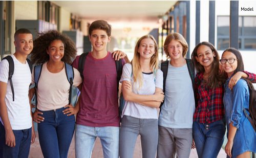 Teenage classmates standing in high school hallway-img-blog