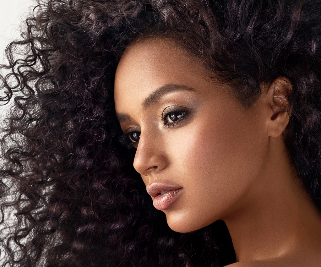 Woman with curly hair profile